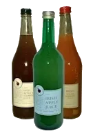 Three bottles of The Apple Farm mixed fruit juices